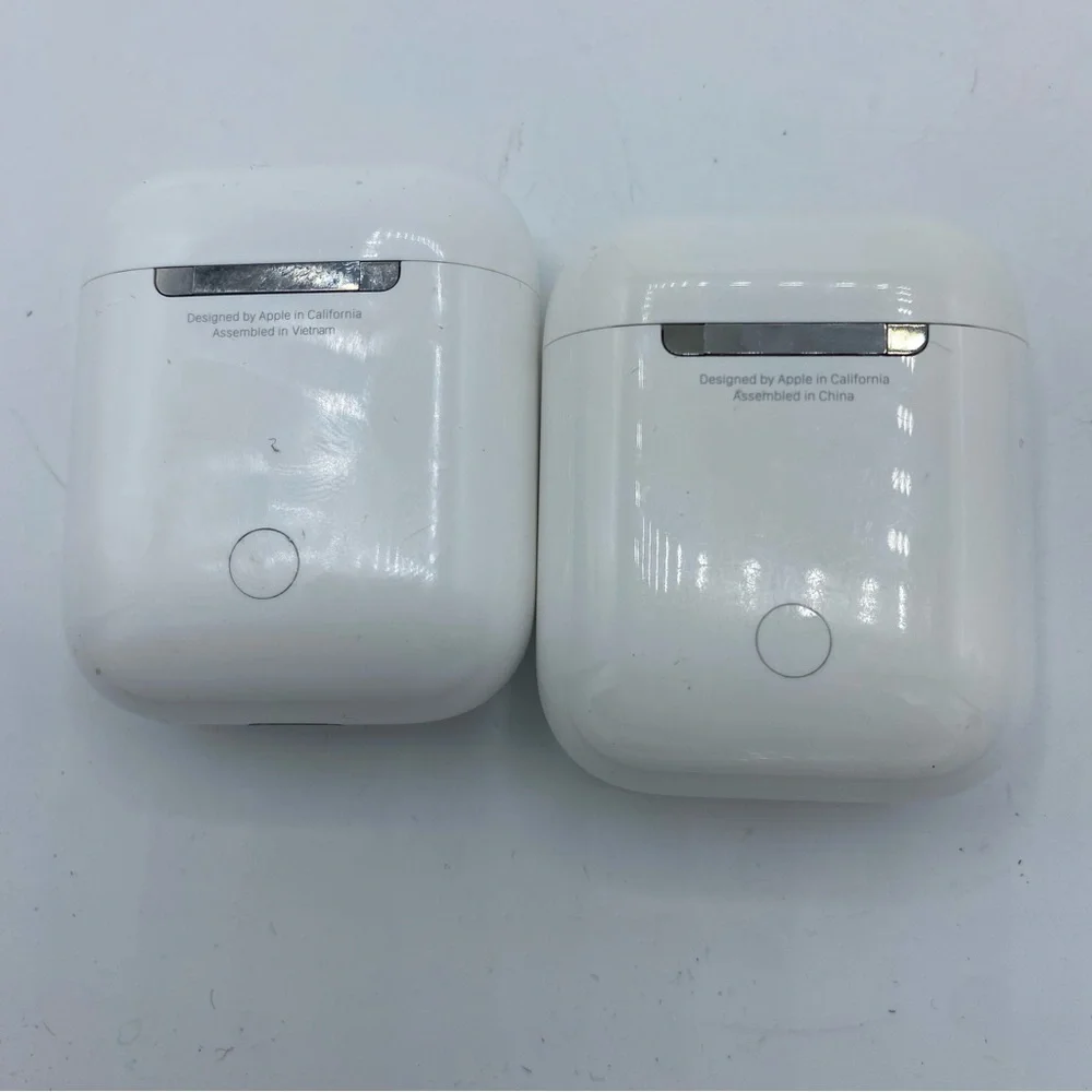 2 pairs of AirPods and charging cases AS IS‎ UNTESTED
